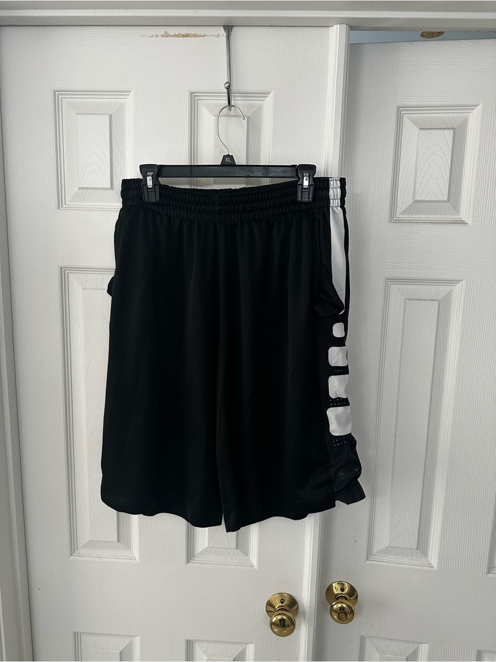 Nike Black Athletic Shorts with White Side Panels and Logo Accents